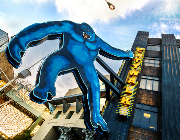 Exterior of entrance to Universal CItyWalk Hollywood featuring larger than life King Kong character made of metal