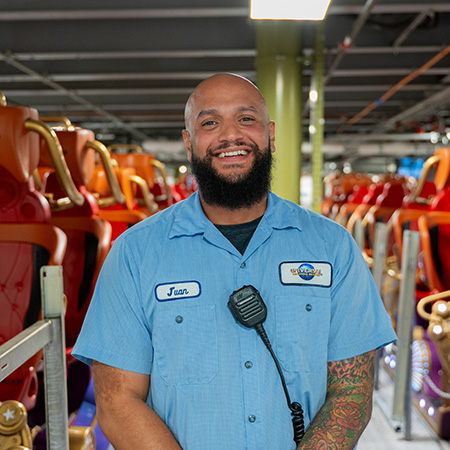 Team Member smiling at the camera