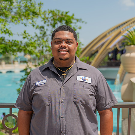 Plumbing Specialist, Jovani, looking at the camera and smiling