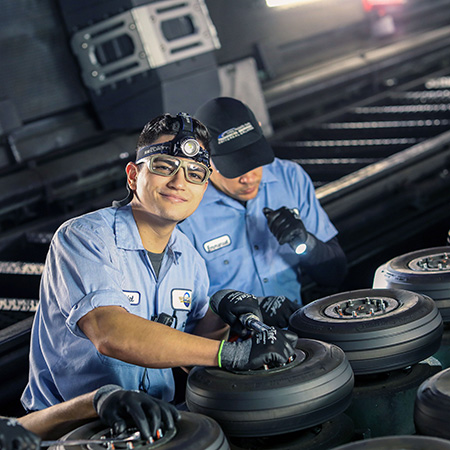 Two Team Member working on a roller coaster track